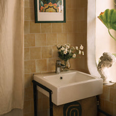 Brown peel-and-stick backsplash tile Smart Tiles in a bathroom