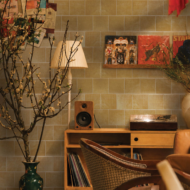 Brown peel-and-stick backsplash tile Smart Tiles in a living room