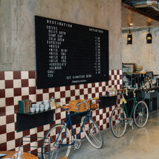 White and red checkerboard peel and stick backsplash tile by Smart Tiles in a vintage restaurant