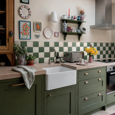 White and green checkerboard peel and stick backsplash tile by Smart Tiles in a rustic kitchen